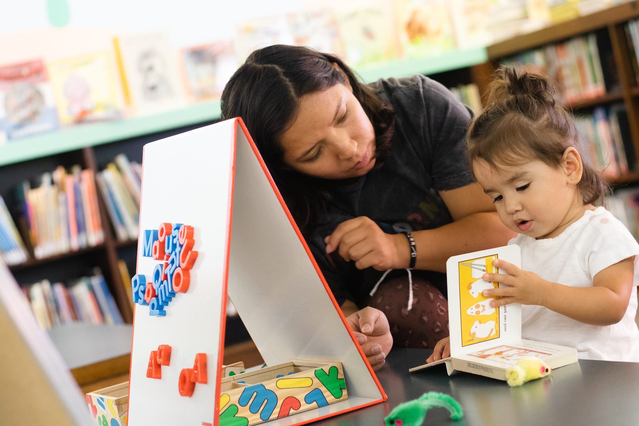 Adult and toddler reading board book